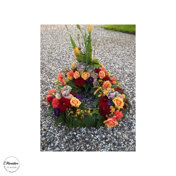 Krans med blomster opsats