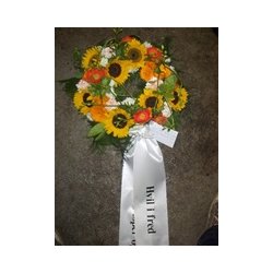 Rundpyntet krans med blomster